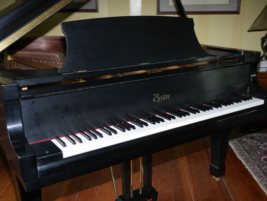 Ebony Boston grand piano in great condition