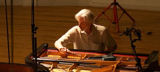 Terry Flynn tuning Grand Piano before concert.