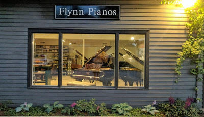 front window of Flynn Pianos Workshop